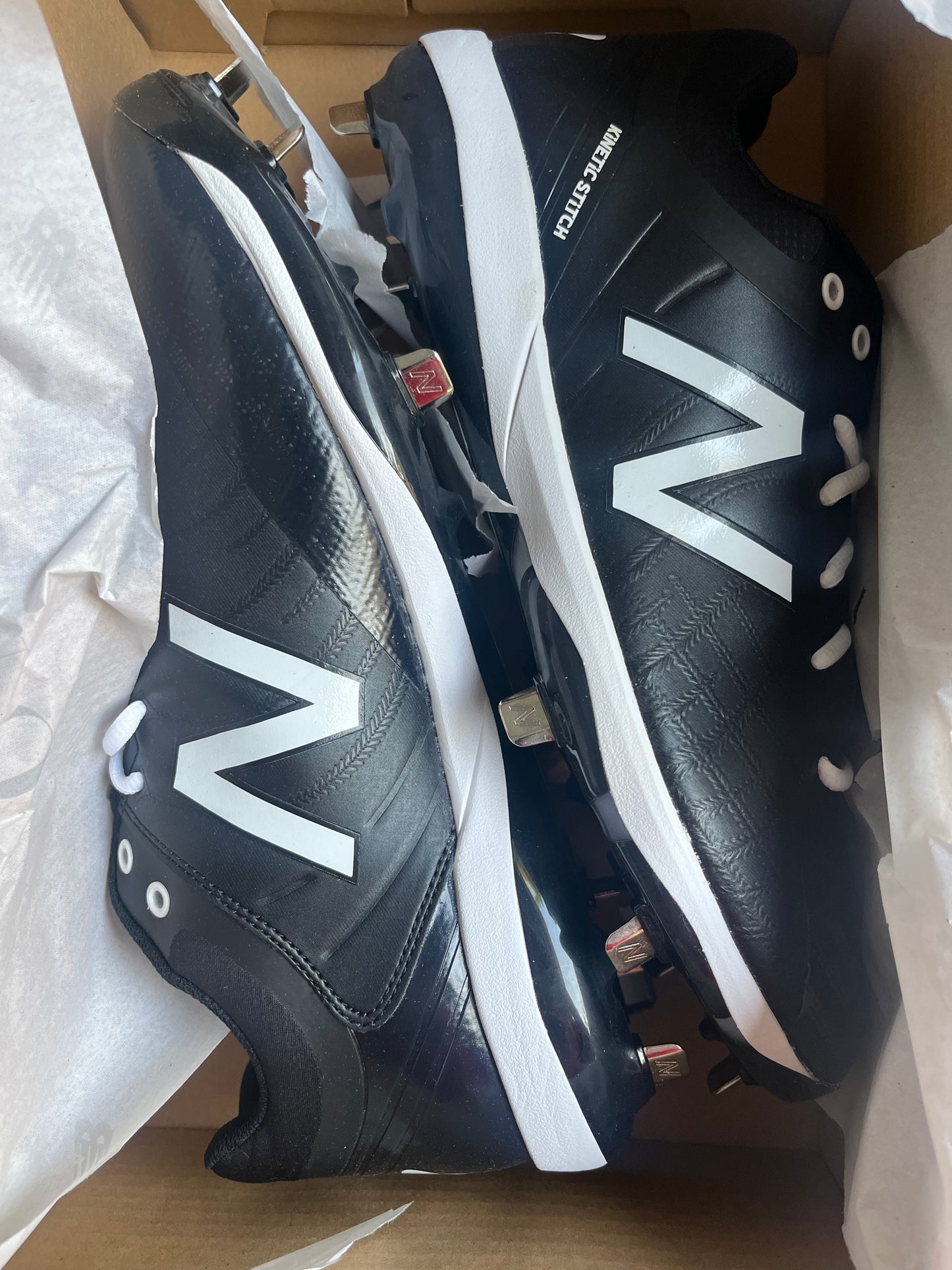 New Balance metal cleats